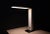Typical 80s square shaped desk lamp, White plastic on a black metal base. Tubular lighting good working condition....