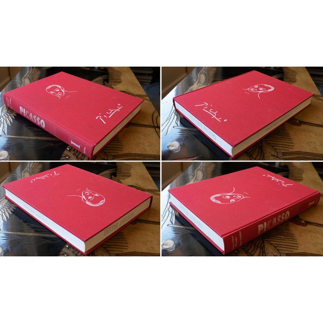 This is a set of two coffee table art books on Pablo Picasso. The larger, red book is "Pablo Picasso 1881-1973" by...