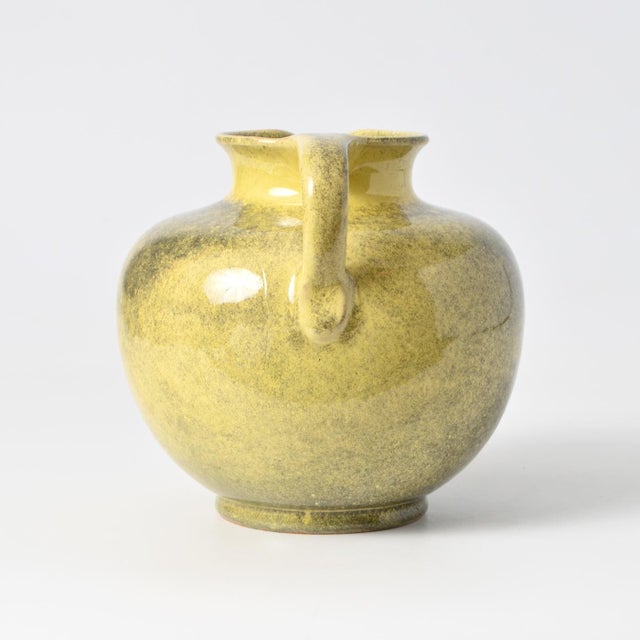 Yellow Glazed Pottery Vase by Richard Uhlemeyer, 1940s, in Flawless conditions. Designed 1920 to 1949 This piece has an...
