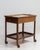 A classic mid-century French bar cart combining functionality with understated elegance. The simple frame and tiered...