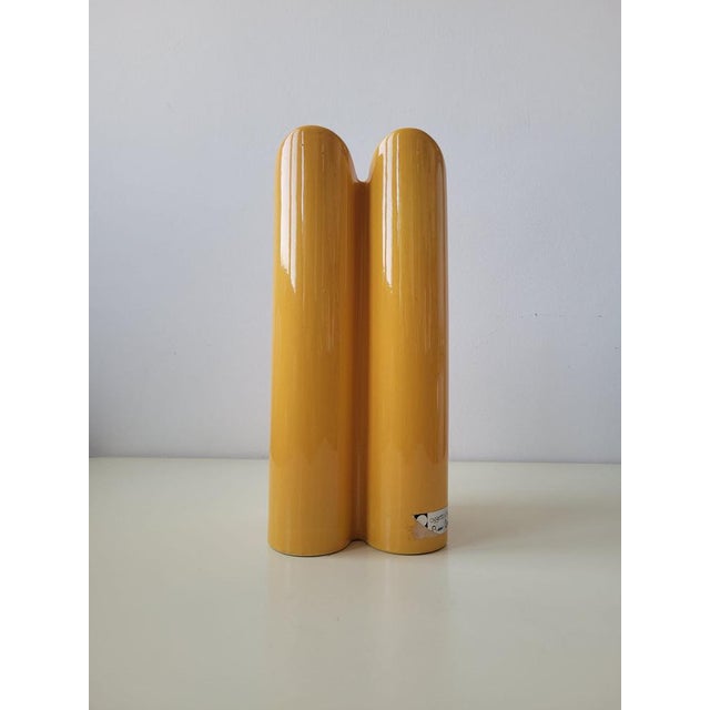 Pierre Cardin's vase, known as the "Quadrifoglio" model (for its four-lobed opening), is a designer object produced in the...