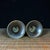 Elevate your tablescape or meditation space with this elegant pair of brass candle holders. Each candlestick features a...