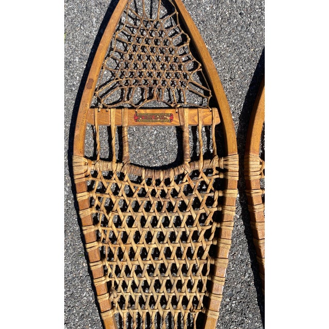 Pair of vintage snow shoes by Tubbs of Norway, Maine.