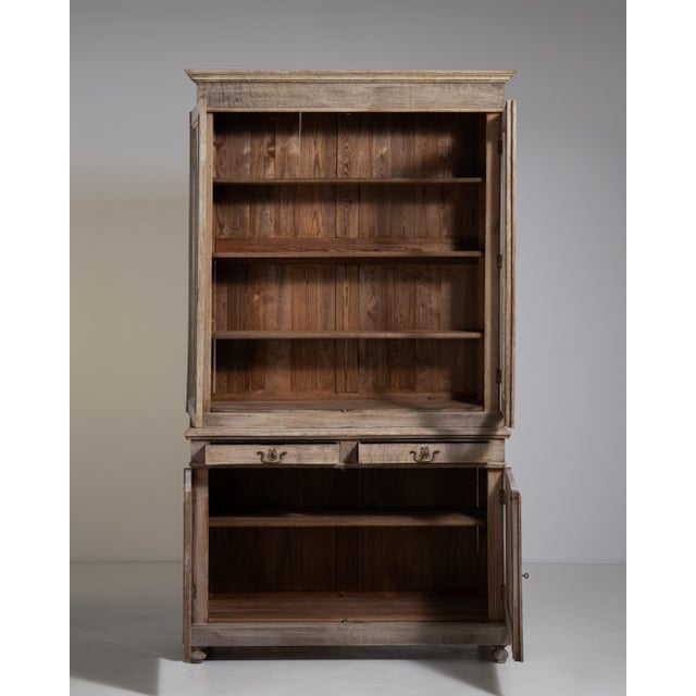A traditional vitrine reflecting the growing importance of display furniture in 19th century homes. As interiors became...
