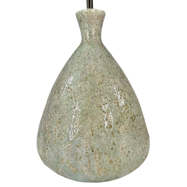 A midcentury Swedish table lamp with a wonderfully bespeckled glaze. Base Measurement is 16" x 16"