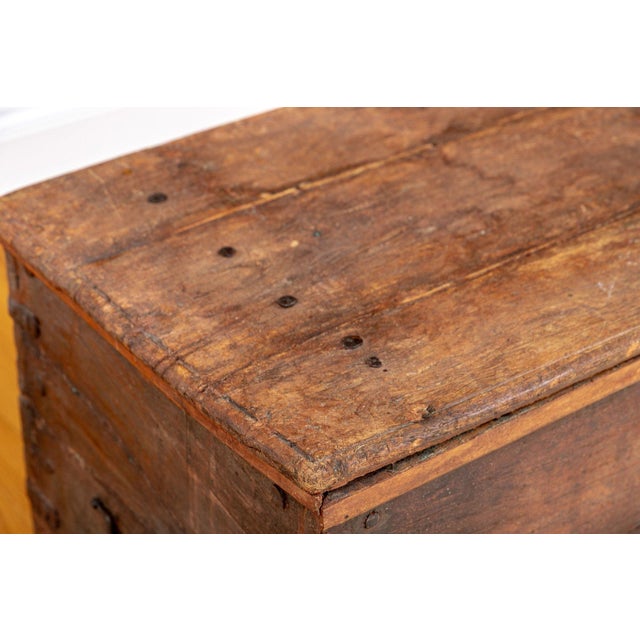 An antique oak chest of genuine and demonstrable age — dating to the 19th century or earlier, constructed from solid oak...