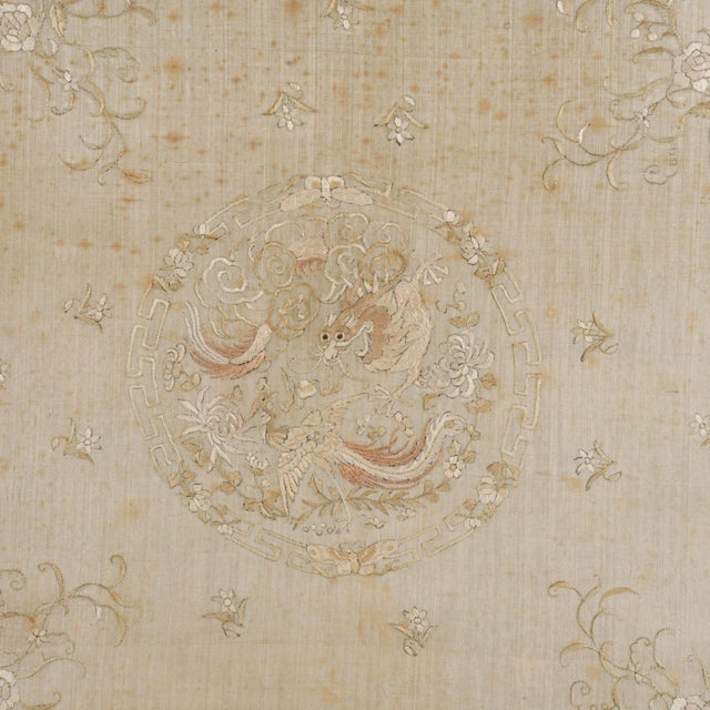 This Framed Chinese Silk features an intricately embroidered composition centered on a circular medallion enclosing two...
