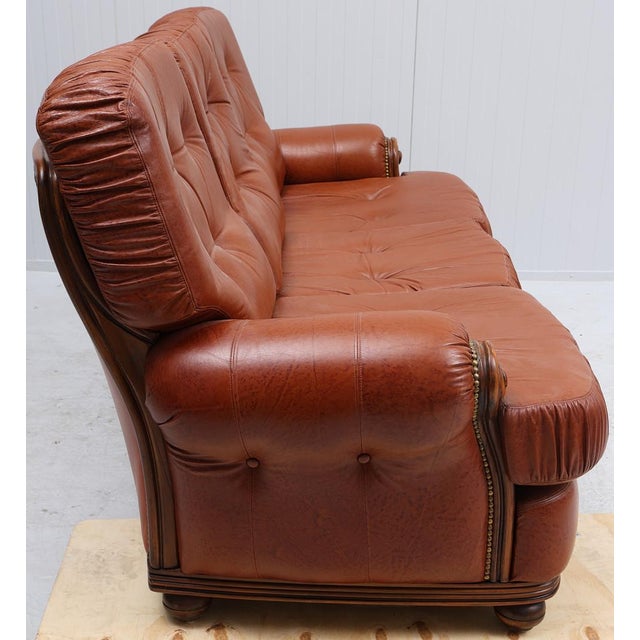 Mid-Century Modern Three-Seater Sofa in Cognac Leather and Wood, 1960s, in Good conditions. Designed 1960 to 1969