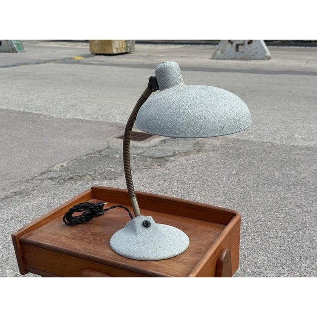 1950s bauhaus adjustable metal table lamp a striking bauhaus-inspired table lamp from the 1950s, crafted in grey textured-...