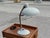 1950s bauhaus adjustable metal table lamp a striking bauhaus-inspired table lamp from the 1950s, crafted in grey textured-...