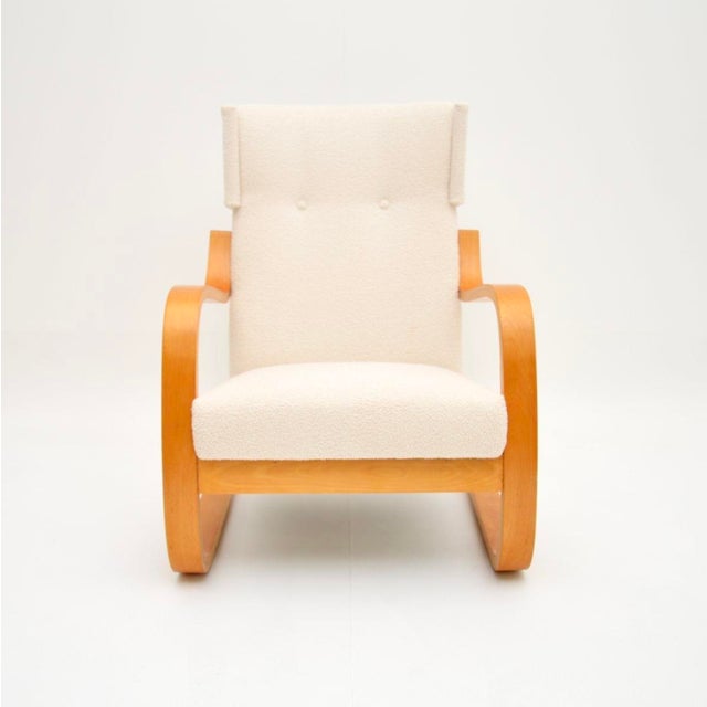 An iconic and rare vintage model 401 armchair by Alvar Aalto. This was made in Finland by Artek, it dates from around the...
