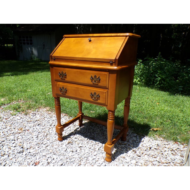 Vintage Early American Style Solid Maple Slant Top Writing Desk Drop Front Secretary Desk. Features a petite space-saving...
