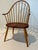These lovely arm chairs anchored the dining room table at my parents' house for almost forty years. I remember watching my...