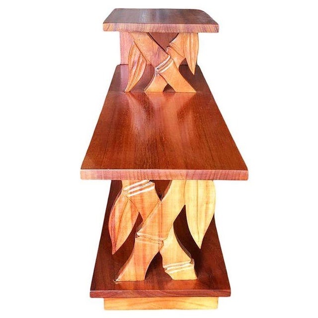 This rare Hawaiian koa wood three-tier table is intricately carved to resemble bamboo, showcasing the artistry and...
