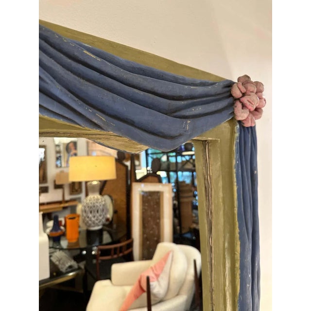 This wonderfully whimsical draping fabric and ribbons mirror ALL in Swedish plaster from early 20th C. The mirror is...