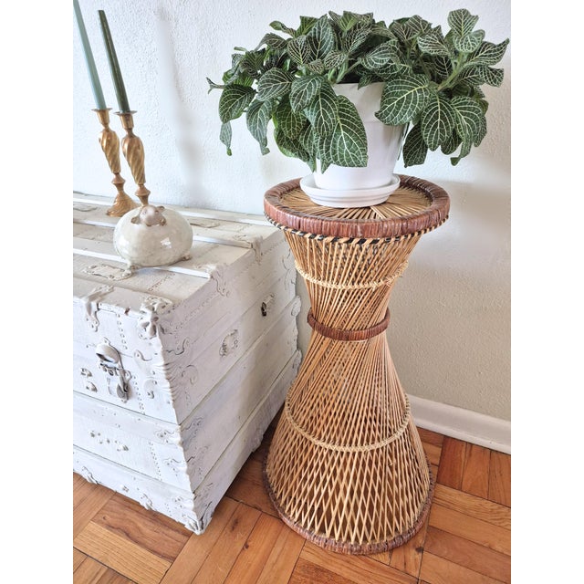 Vintage woven plant stand, pedastal, circa 1970's. Tall, textured, adds natural warmth to any vignette. Stands 27.5 inches...