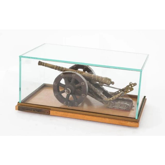 This is a superb decorative glass cased bronze model of the Colubrina da Fortezza cannon, late 19th century in date. It...