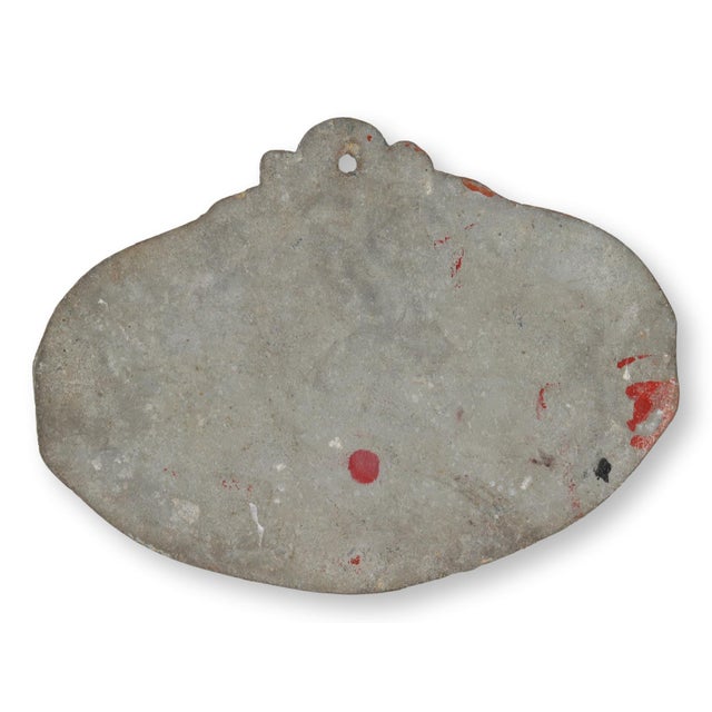 A relic of rural pride, this cast-metal prize plaque was awarded at the 1953 Cambrai Departmental Livestock Contest....