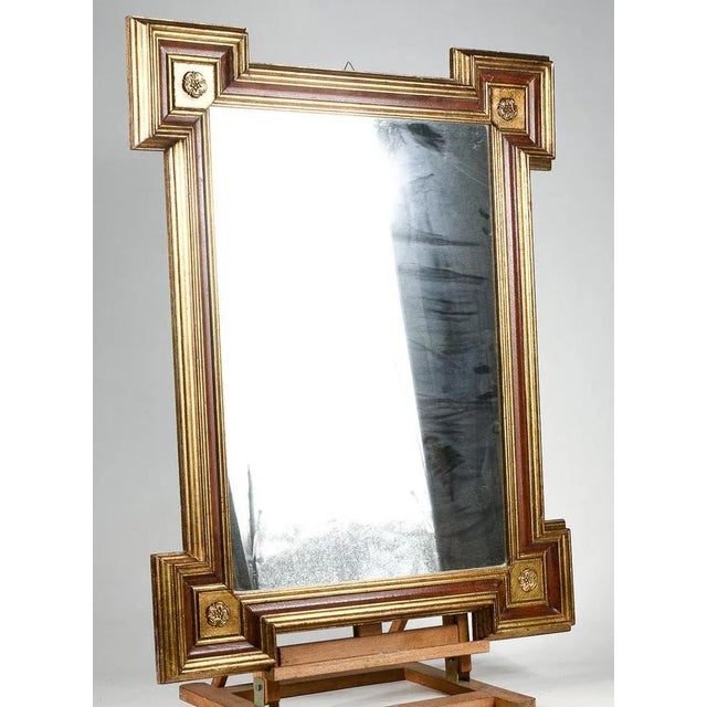 Mirror two-tone gold and red, with frame and squares on the corners italy 1990 measurements 68.5 cm x h 89 cm category...