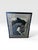 A striking Patrick Nagel commemorative serigraph featuring the iconic “Woman with Horse” composition, showcasing the...