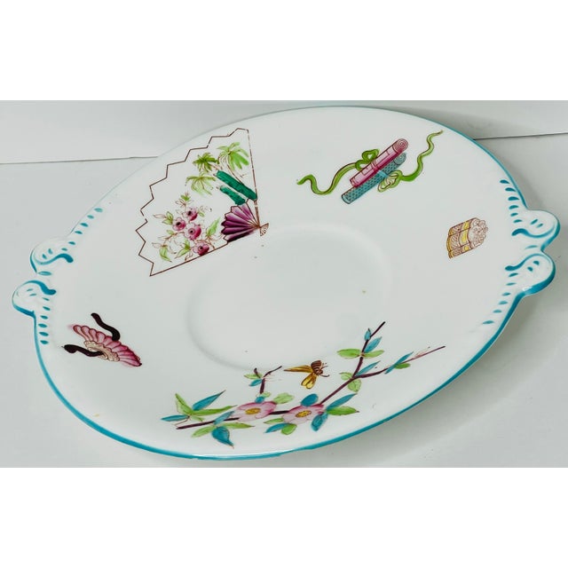 Plate is not marked Minton but has all the hallmarks that it is. Aesthetic period, chinoiserie, etc..