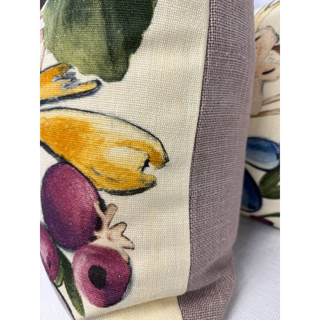 Custom pair of 22" pillows covered in Dedar "About Flowers" in color 01 marquises and backed in a coordinating lavender...