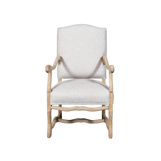 Upholstered armchair. Scroll arms and legs. H-stretcher.