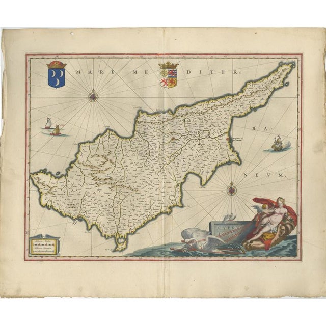 A highly decorative and visually striking blaeu map of cyprus, “insula cypri”, published in amsterdam circa 1640,...
