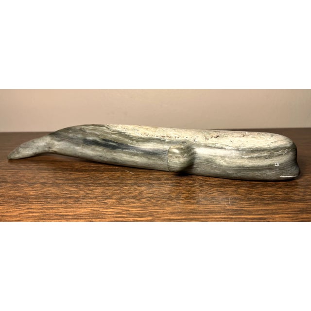Up for sale is a Vintage Canadian Inuit Argillite Stone Whale Carving by Mina Iqaluq (20th Century)! It has her name in...