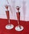 A pair of weighted sterling silver Art Deco candlesticks measures 10 1/8 in. tall, 2 1/8 in. in diameter at the top, and 3...