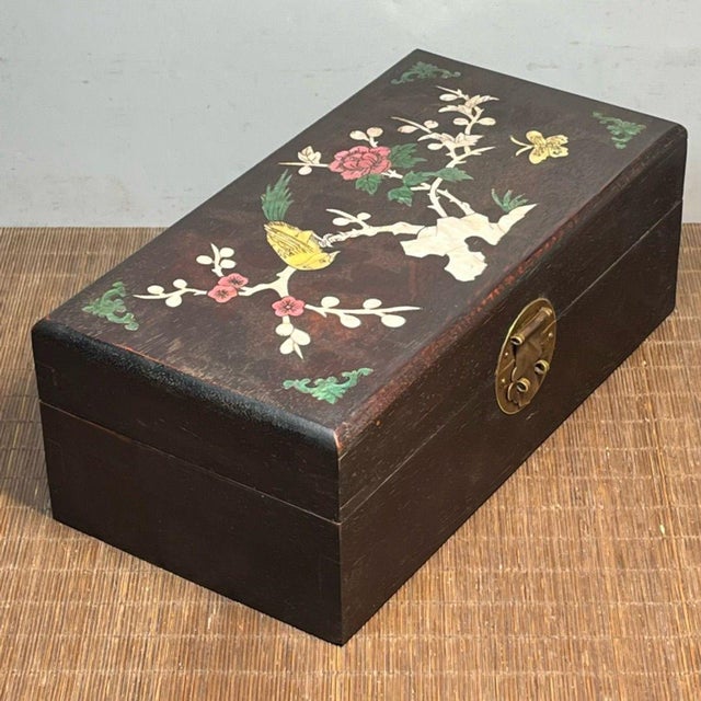 This elegant vintage wooden box is a beautiful example of traditional Chinese craftsmanship. Crafted from ebonized wood...