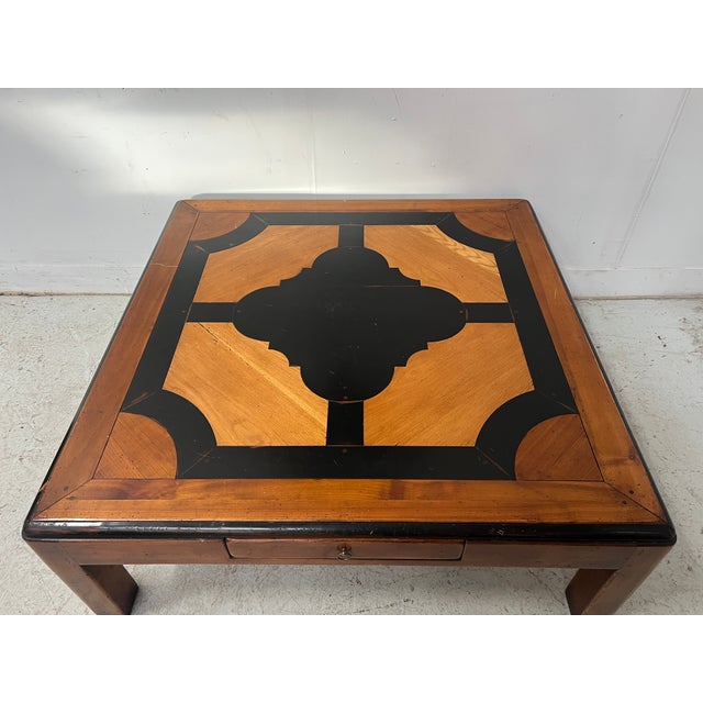 Coffee table with marquetry decoration Walnut wood frame One side drawer on the front Marquet top with geometric...