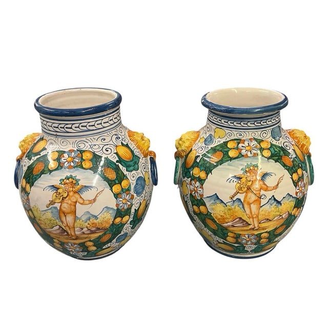 Mediterranean A Pair of Vintage Italianate Majolica Ceramic Urns With Putti & Lion Ring Handles For Sale - Image 3 of 10