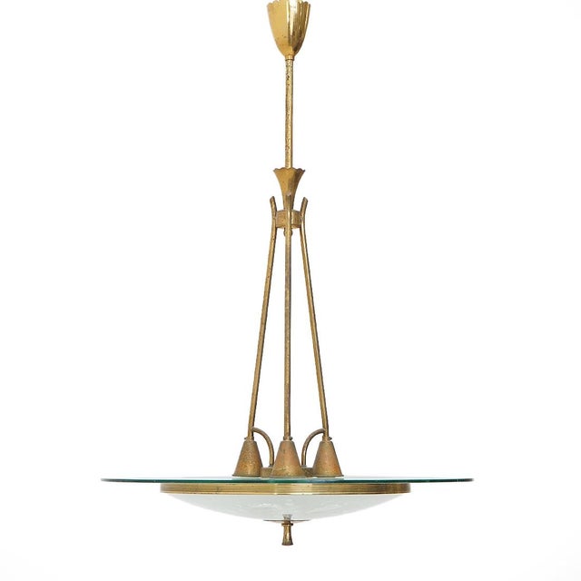 Elegant Italian chandelier from the 1950s, made of brass and etched glass. The brass structure, with three slender arms...