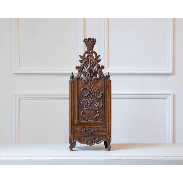 This impressive Provençal fariniero is finely carved in solid walnut and exemplifies the regional craftsmanship of...