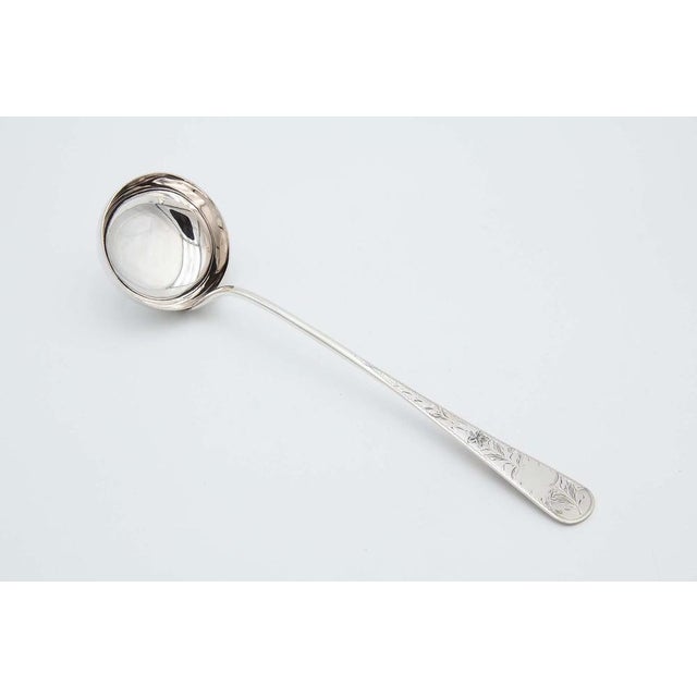 Silver Soup Ladle with Engraved Floral Motifs, in Good conditions.