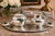 A rare and highly collectible Mexican Modernist tabletop set designed and handcrafted by renowned silversmith Emilia...