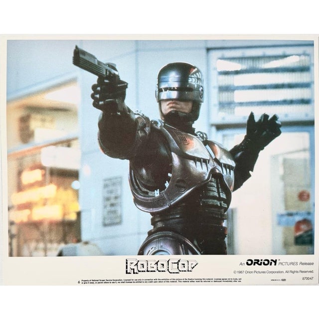 RoboCop 1987 Original Vintage Cinema Lobby Card Framed In Black. Extra Large 11x14" inches / 28x36 cm paper size 18x21"...