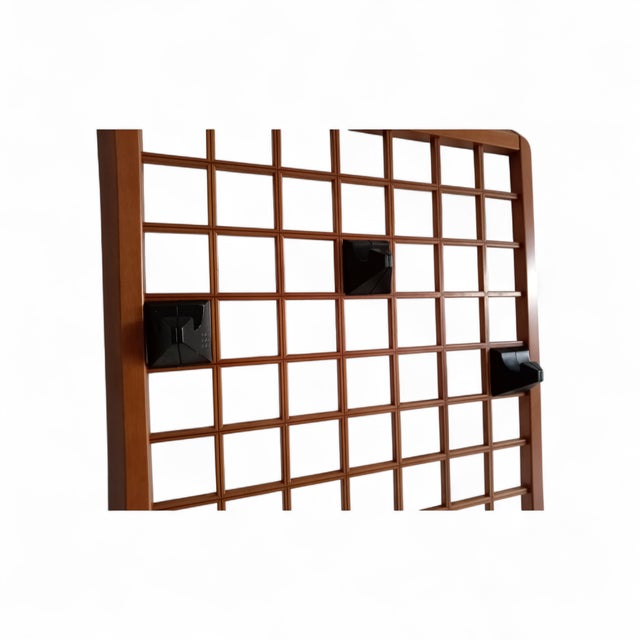 Wall-mounted coat rack with movable hooks, which can be arranged as desired and used, designed by Fabrizio Poldaretti in...