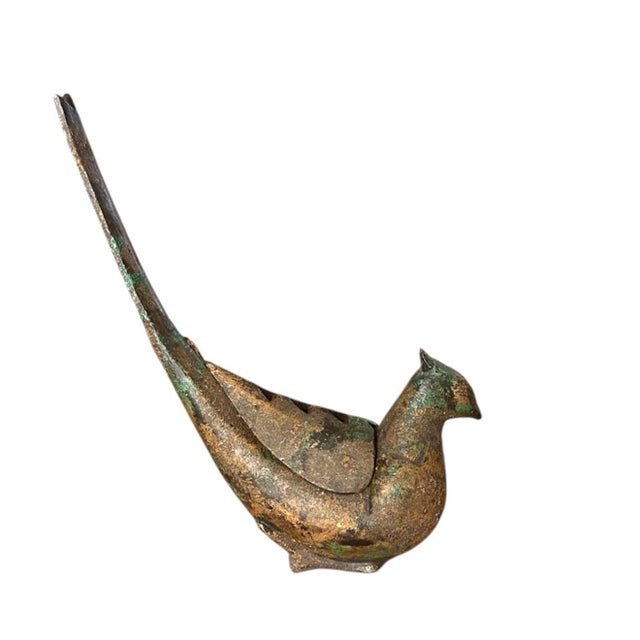 A beautiful, Mid-Century Koro bird indented burner. Features a two-piece, cast bird in the manner of a pheasant with a...