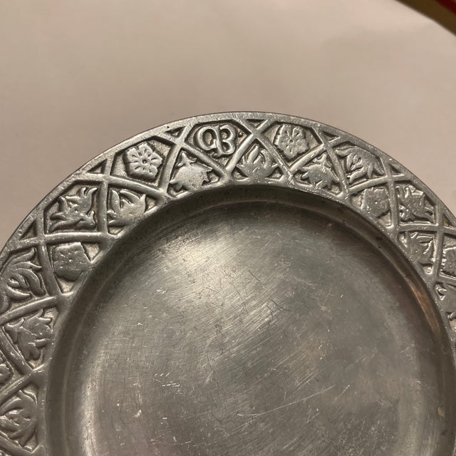 Mid 20th Century American Pewter Round Plate, perfect for bon bons, with embossed mannerism designs featuring floral...