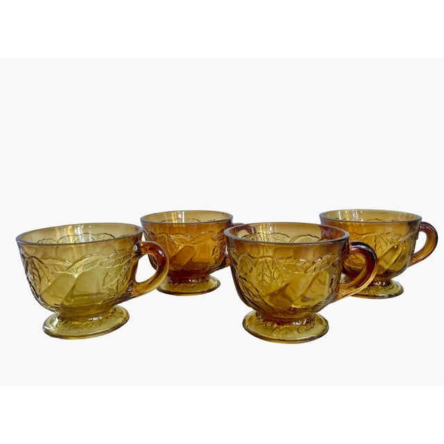 Vintage Tiara Glass Amber Ice Cream Footed Cups – Set of 4 This charming set of 4-footed cups features an embossed pear-...