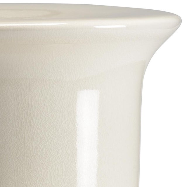 Timeless style and function are created with our garden stool. The durable cream crackle glazed porcelain creates a...