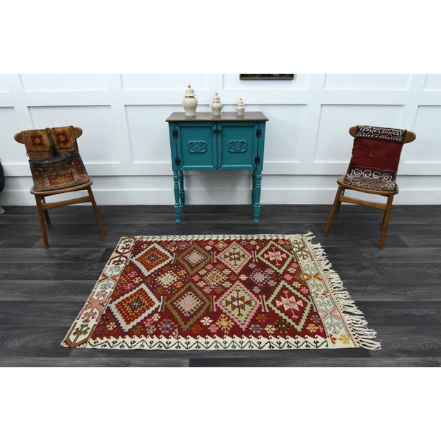 Vintage Turkish Hand-Knotted vintage rug is a semi-antique vintage area rug.'70s Eastern region of Turkey's unique rug is...