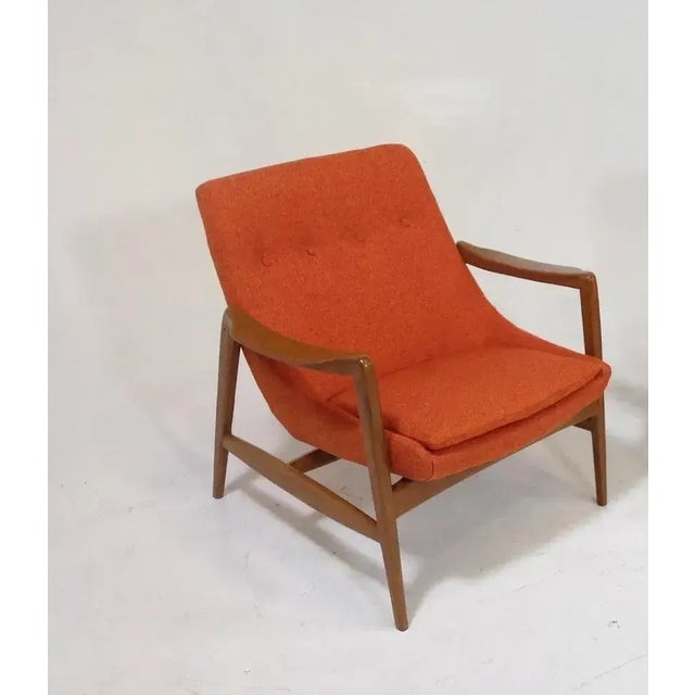 Mid-Century Modern lounge chair in the style of Ib Kofod-Larsen. Stunning lounge chairs; Mid-century style at its finest!...