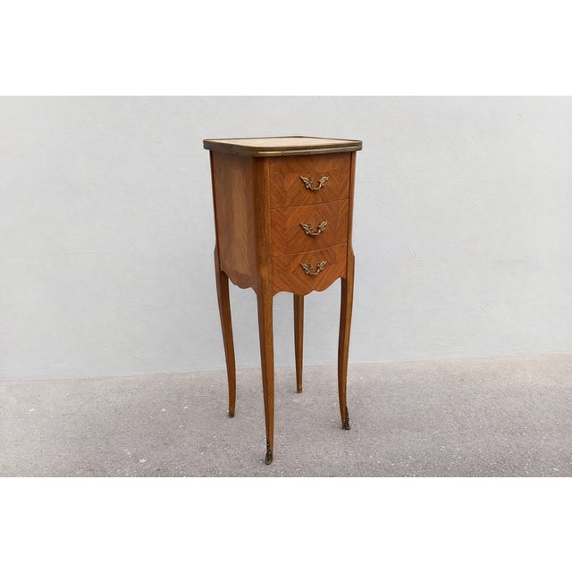 French occasionnal table from the first half of the XXth century The marble top allows you to put a hot teapot or coffee...