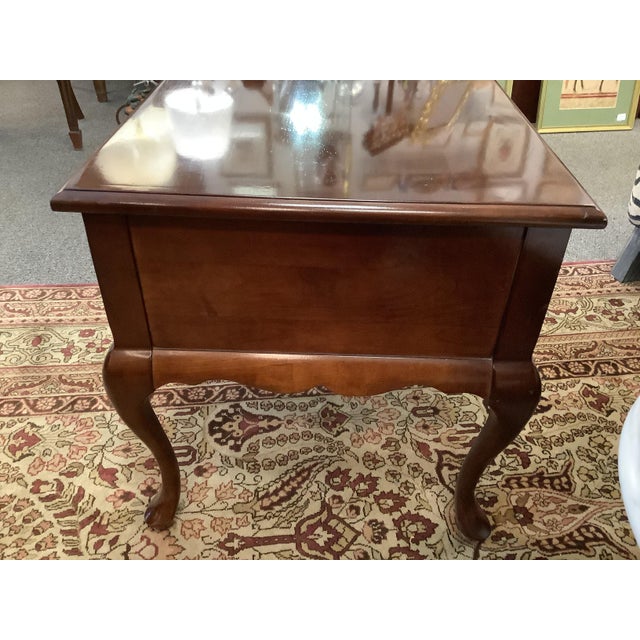Traditional mahogany side table with brass hardware. Made by Hammary. Single drawer.