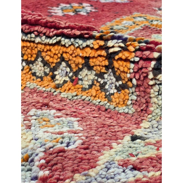 Vintage Moroccan Tribal Rug | Handwoven Berber Wool Rug with Red Field and Diamond Medallions This striking vintage tribal...