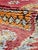 Vintage Moroccan Tribal Rug | Handwoven Berber Wool Rug with Red Field and Diamond Medallions This striking vintage tribal...