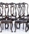 Set of two armchairs and seven chairs Portuguese, late 19th century, made of rosewood. Open backs, leather seats with...